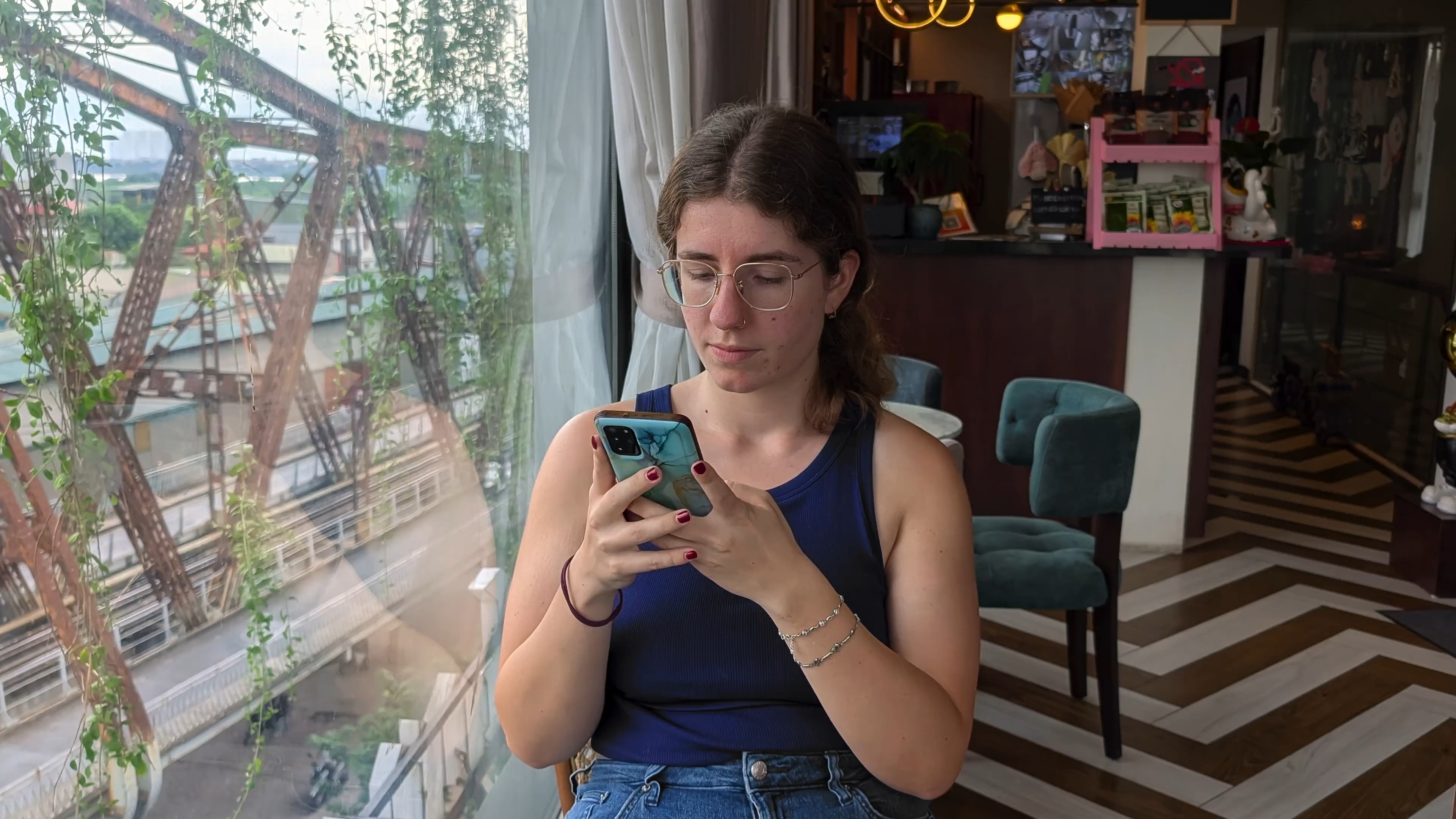 Sarah using data at a local cafe in Hanoi, Vietnam